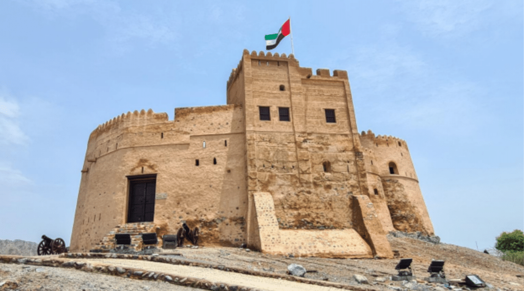 Best places to visit in Fujairah featuring the coastline, Hajar Mountains and historic fort