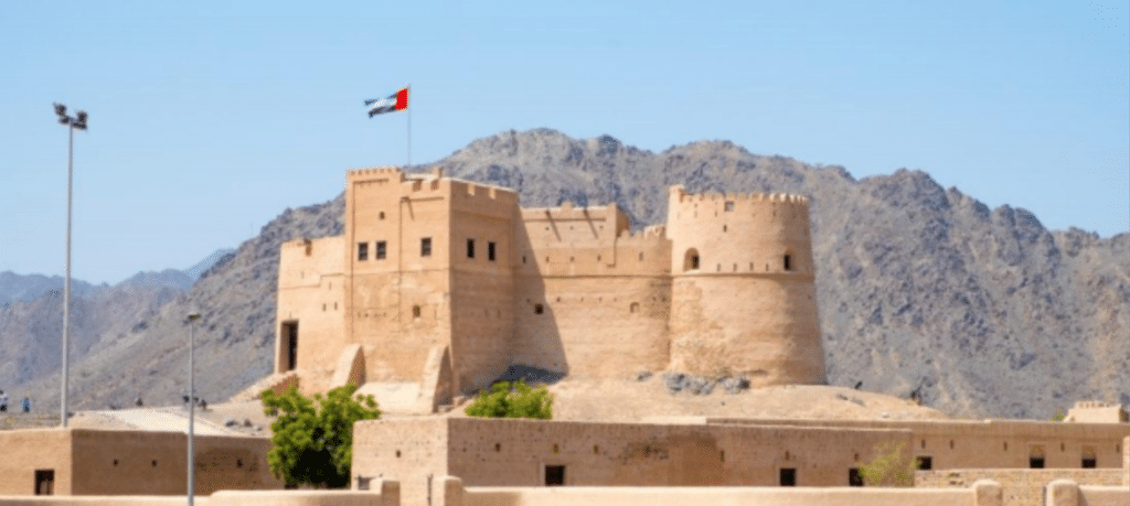 Best places to visit in Fujairah featuring the coastline, Hajar Mountains and historic fort