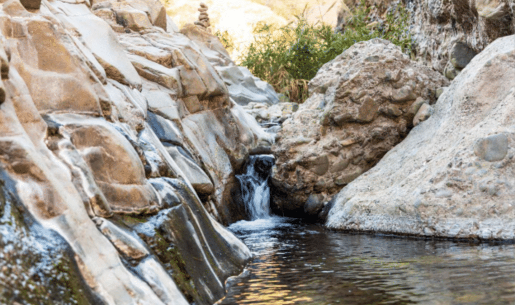 Best places to visit in Fujairah featuring the coastline, Hajar Mountains and historic fort