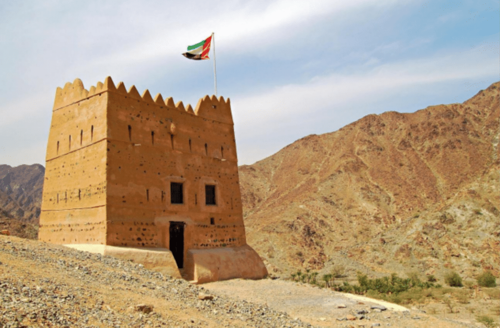 Best places to visit in Fujairah featuring the coastline, Hajar Mountains and historic fort